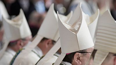 Catholic bishops during a mass. mitre, miter, miters, hat, religious