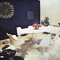 Figure 2: Social and economic considerations in interior design.(right) Simple pedestal table and chairs appropriate to the dining room of the mid-20th century family designed by Eero Saarinen, 1956-59.