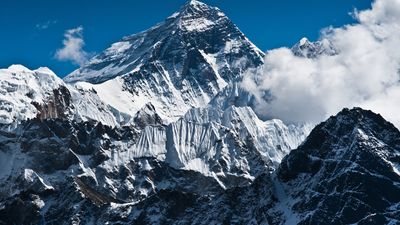 Snow and ice surround the peak of Mount Everest, the highest point on Earth.