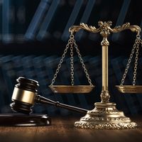 Courtroom gavel and scales of justice