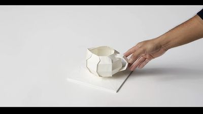 View Swiss artist Sipho Mabona transforming an origami trivet into a swallow