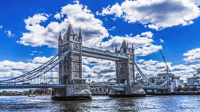 Tower Bridge over the Thames River in London, England. Opened in 1894. Remains an Important Traffic Route with 40,000 Crossings Every Day.